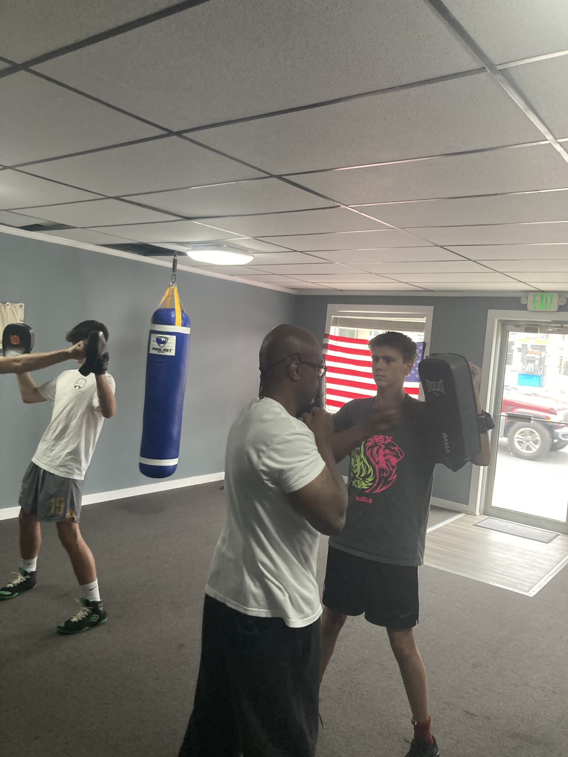 Student working strike shields in class